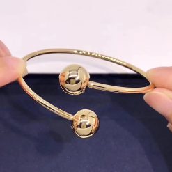 tiffany-hardwear-ball-bypass-bracelet-in-yellow-gold-60152620